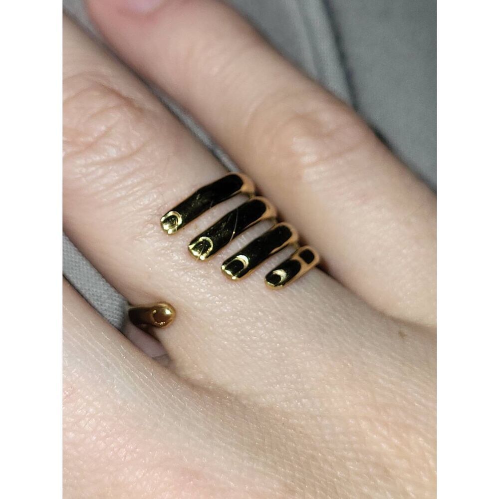 NWOT Surrealist Gold Plated Adjustable Hand Ring Size 6-7